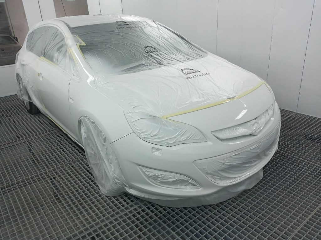 Car front in spray booth